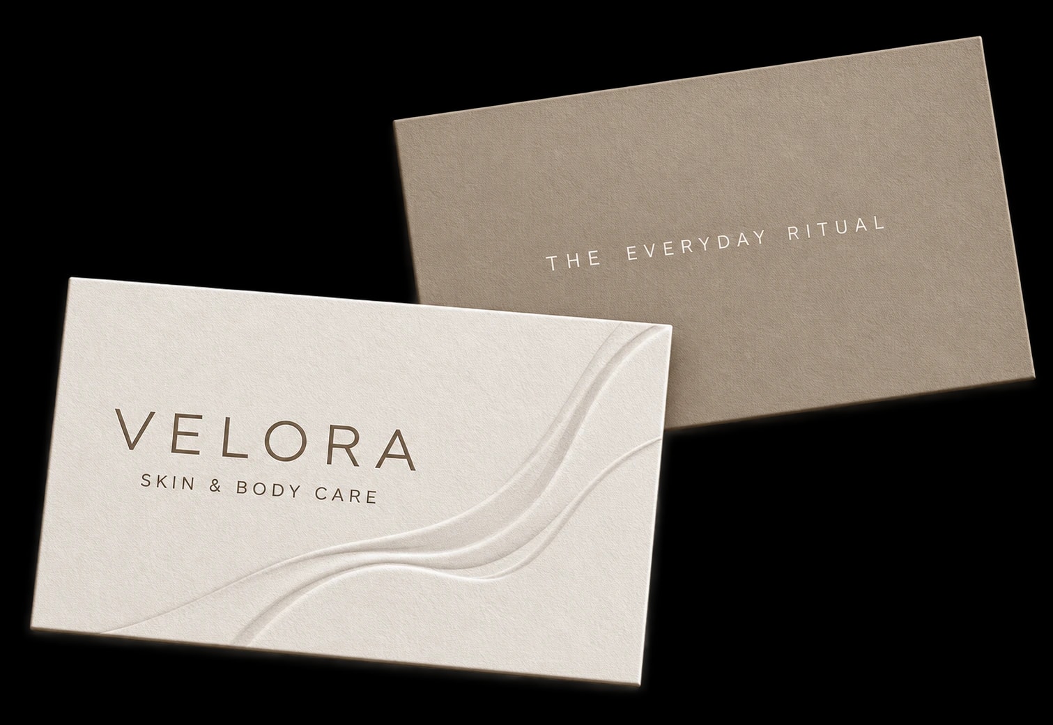 VELORA business cards with embossed flowing contours on cream and taupe paper